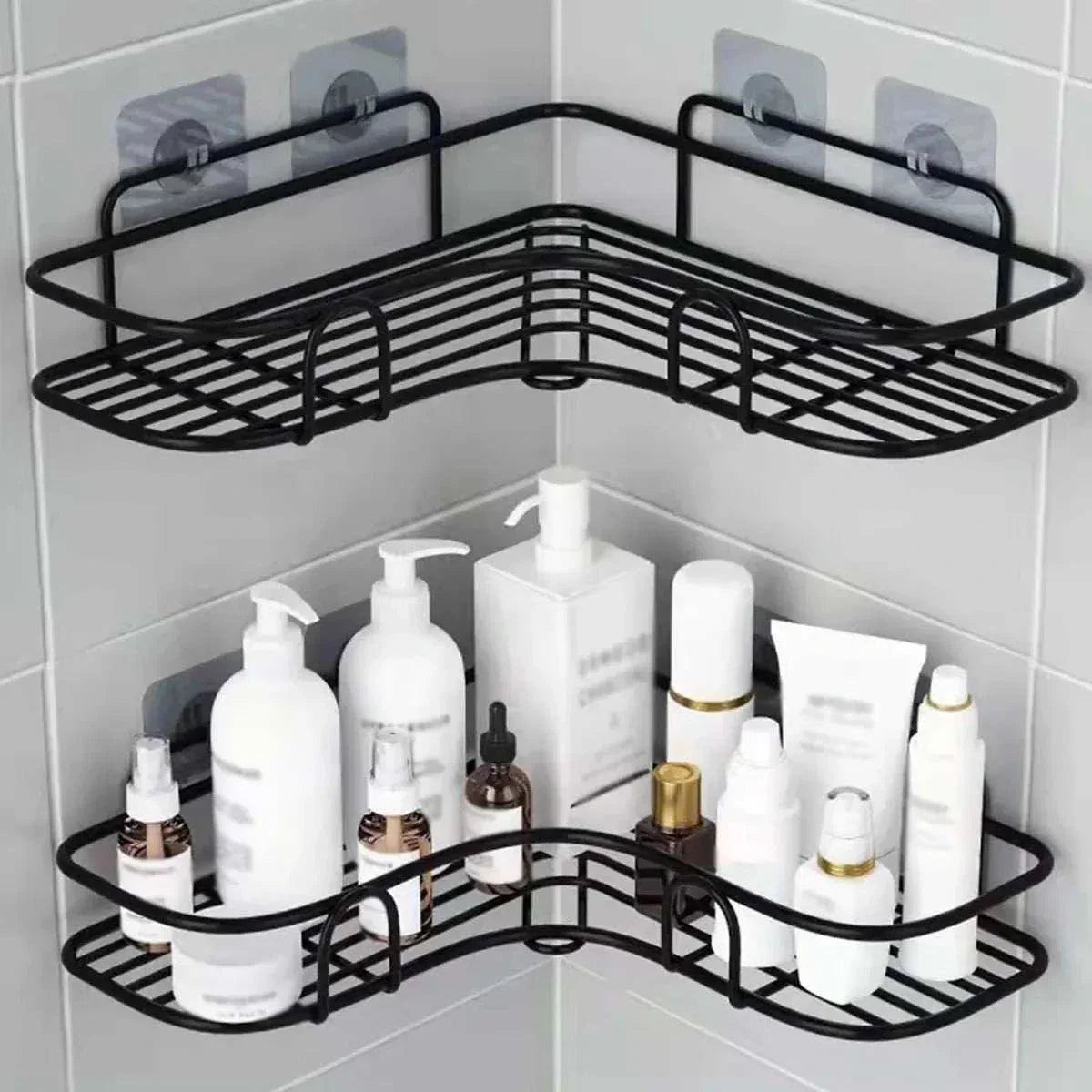 Wall mounted bathroom triangle storage rack with toiletries on tiled wall.